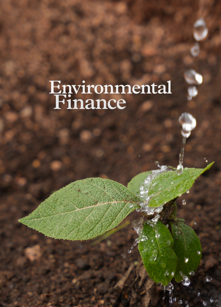 spritzing water from a thin spray arc onto a small green plant with textured leaves growing in brown soil, white bold "Environmental Finance" text overlay.