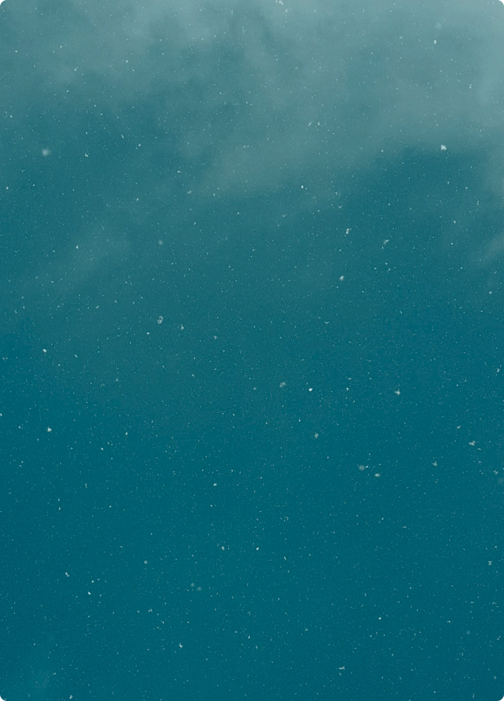 A teal gradient underwater scene with small white particles floating, resembling light specks or bubbles.