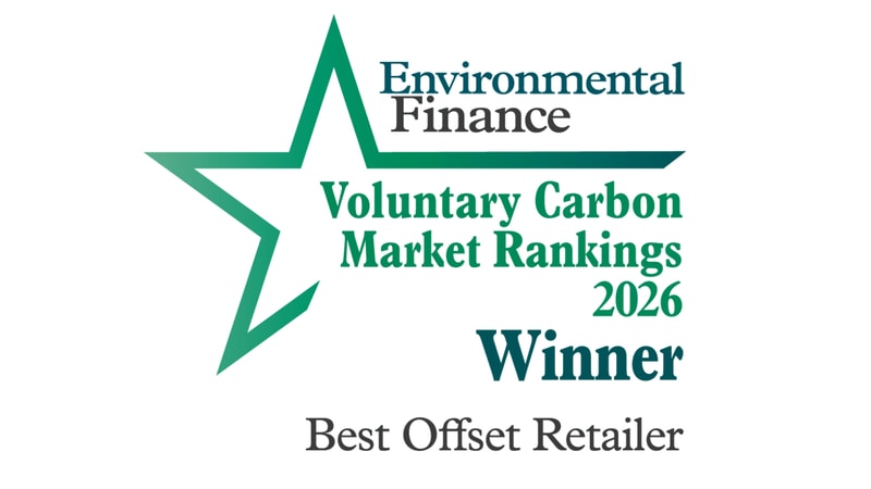 Award seal showing Environmental Finance Voluntary Carbon Market Rankings 2026 with a teal star outline and text “Winner” and “Best Offset Retailer” in dark green/gray.