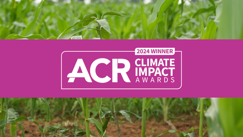 ACR Climate Impact Awards banner in a purple strip over a field of green corn stalks, with bold white logo text and “2024 WINNER” badge.