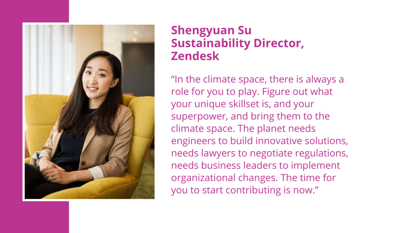 Shengyuan Su sits in a yellow chair, smiling confidently, wearing a tan blazer over a dark top, in a bright, modern office setting.