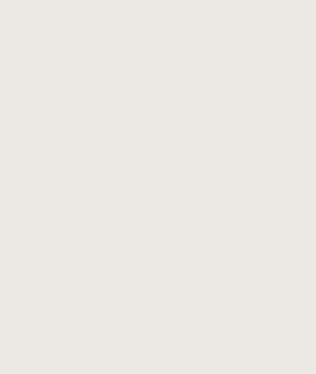blank light beige background with no distinct objects or subjects.